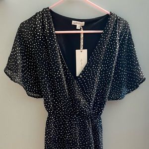 Short sleeve black long dress. Size Large. Never worn.